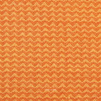 A close-up of a woven fabric with a repeating chevron pattern in orange and cream.